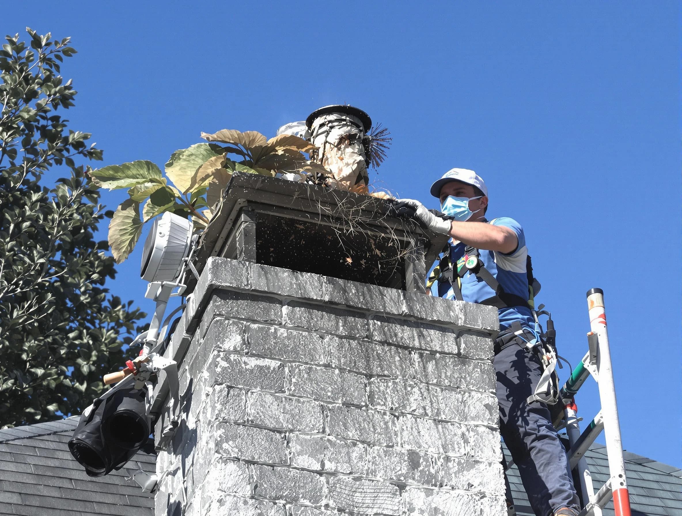East Brunswick Chimney Sweep specialist performing chimney cleaning in East Brunswick, NJ